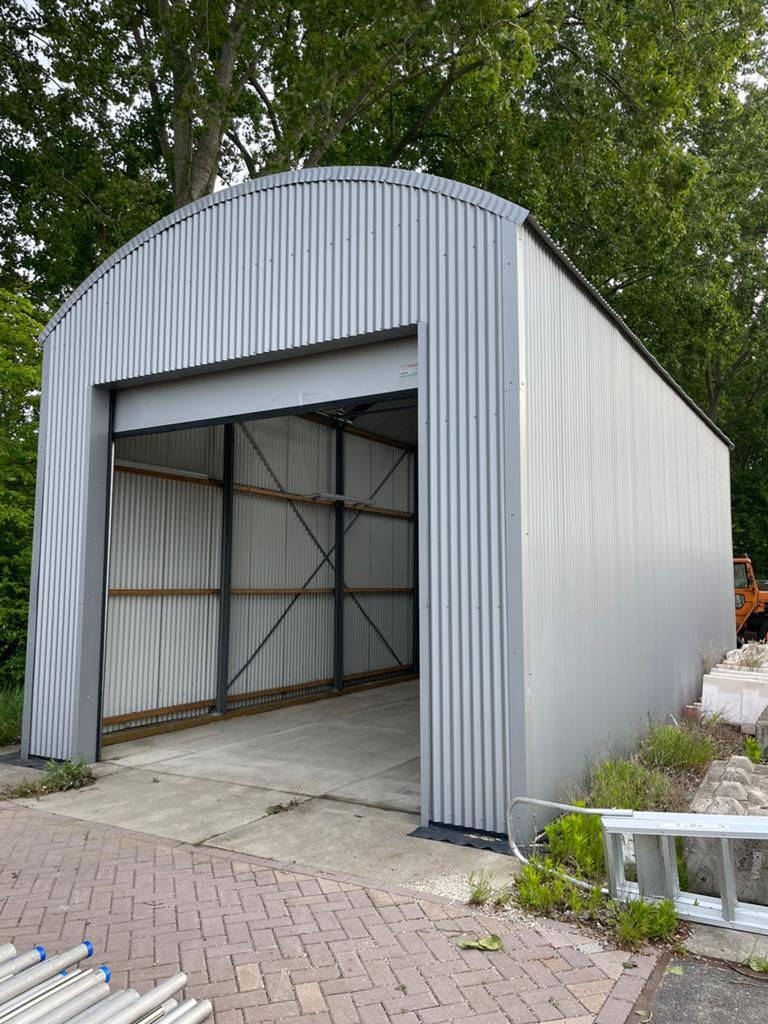 Complete demontabele opslagloods met elektrische roldeur, Ophalen, Zo goed als nieuw
