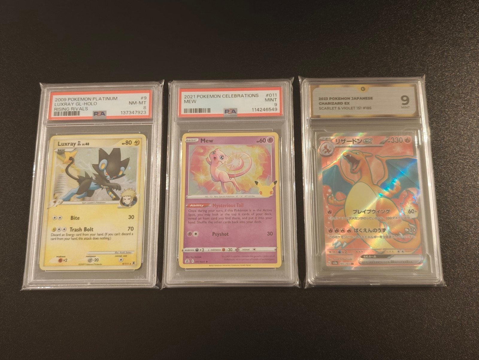Pokémon PSA Graded Kaarten: Luxray, Mew, Charizard, Ophalen of Verzenden, Zo goed als nieuw, Meerdere kaarten
