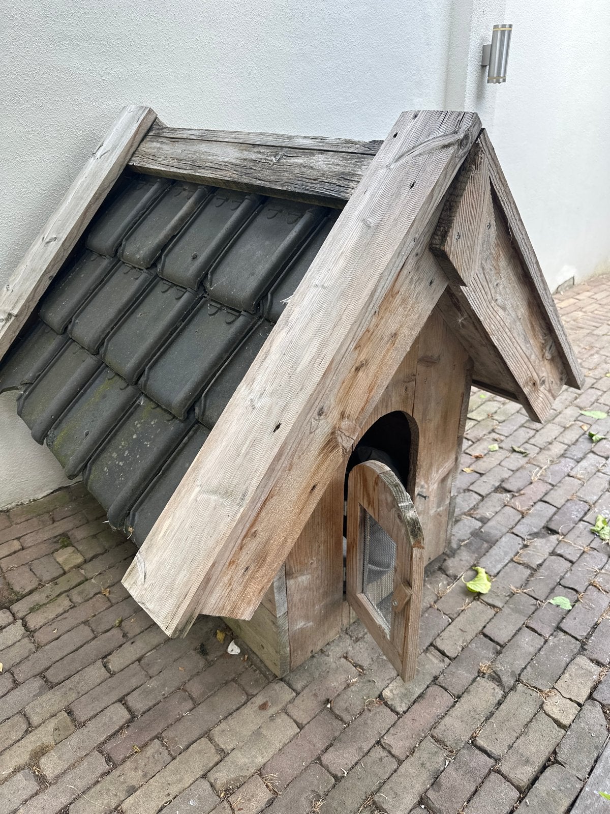 Hondenhok voor buiten, Ophalen