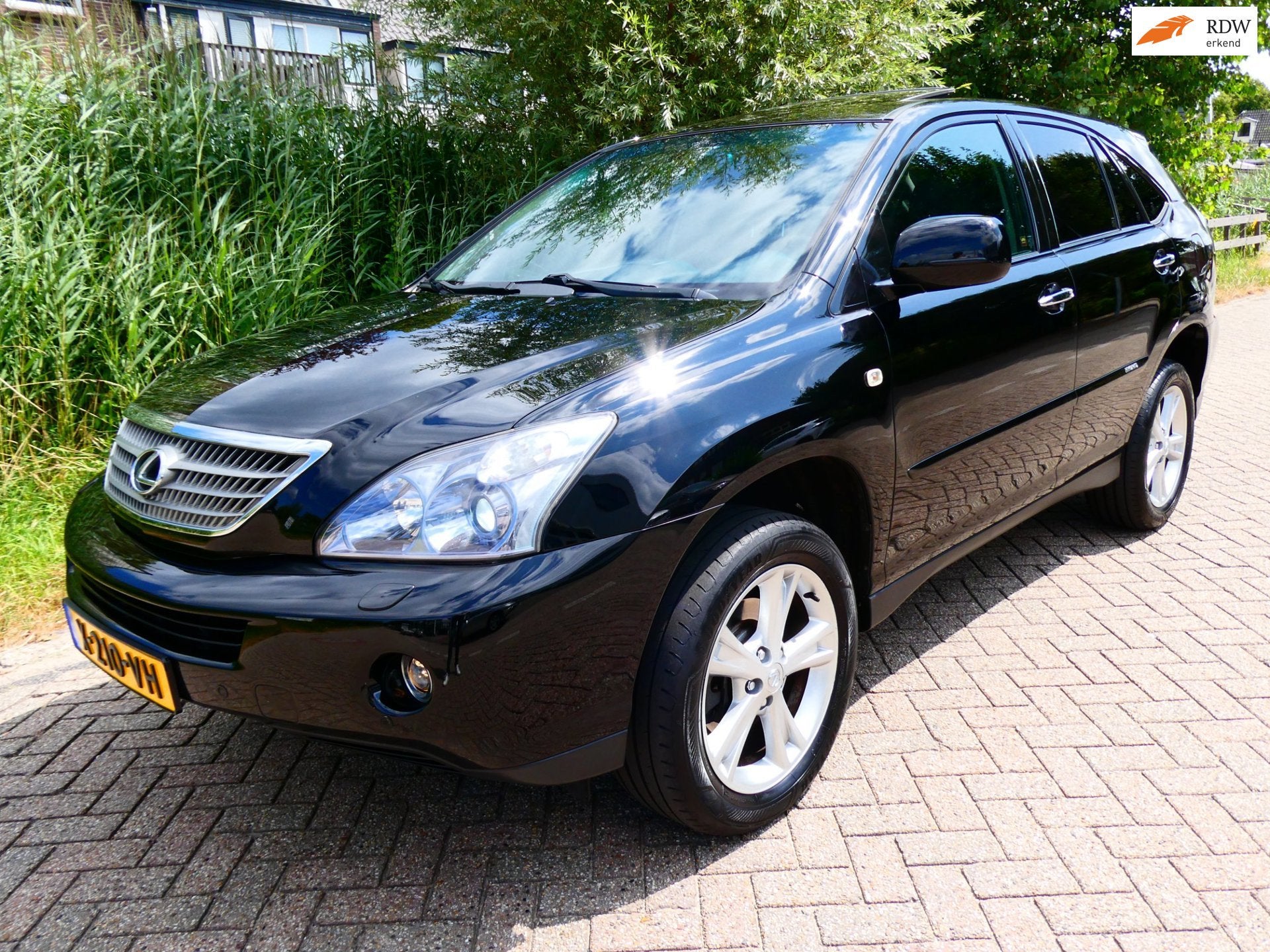 Lexus RX 400h 211pk Automaat Clima Leder Navi Schuifdak Xeno, Auto's, Lexus, Automaat, 3311 cc, Gebruikt, Zwart