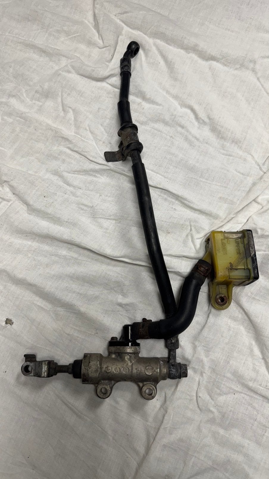 Achterrempomp Honda NX 650 Dominator inclusief reservoir, Ophalen of Verzenden