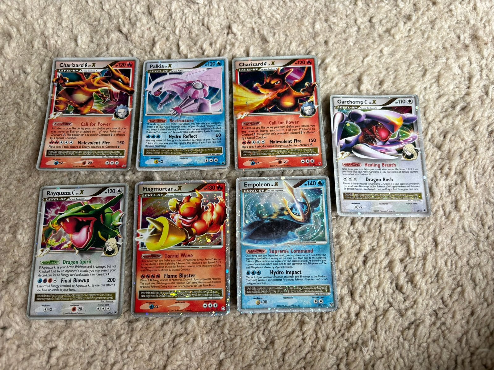 Lv X kaarten 2x Charizard Rayquaza en meer, Ophalen of Verzenden, Zo goed als nieuw, Meerdere kaarten
