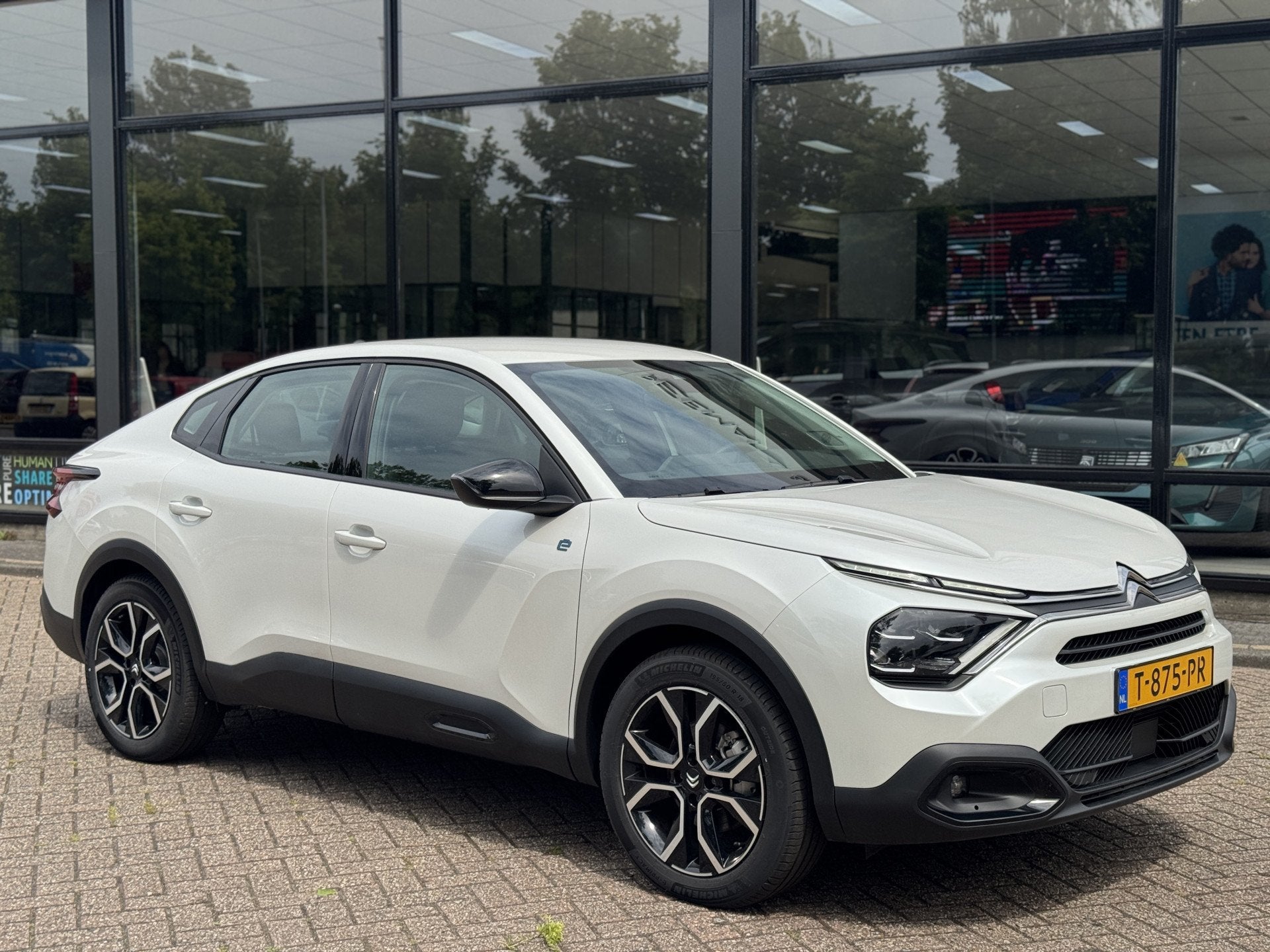 Citroën Ë-C4 X Feel Pack 50 kWh Camera|Stoel/Stuur verwarm, Auto's, Citroën, 136 pk, Gebruikt, Zwart, Wit