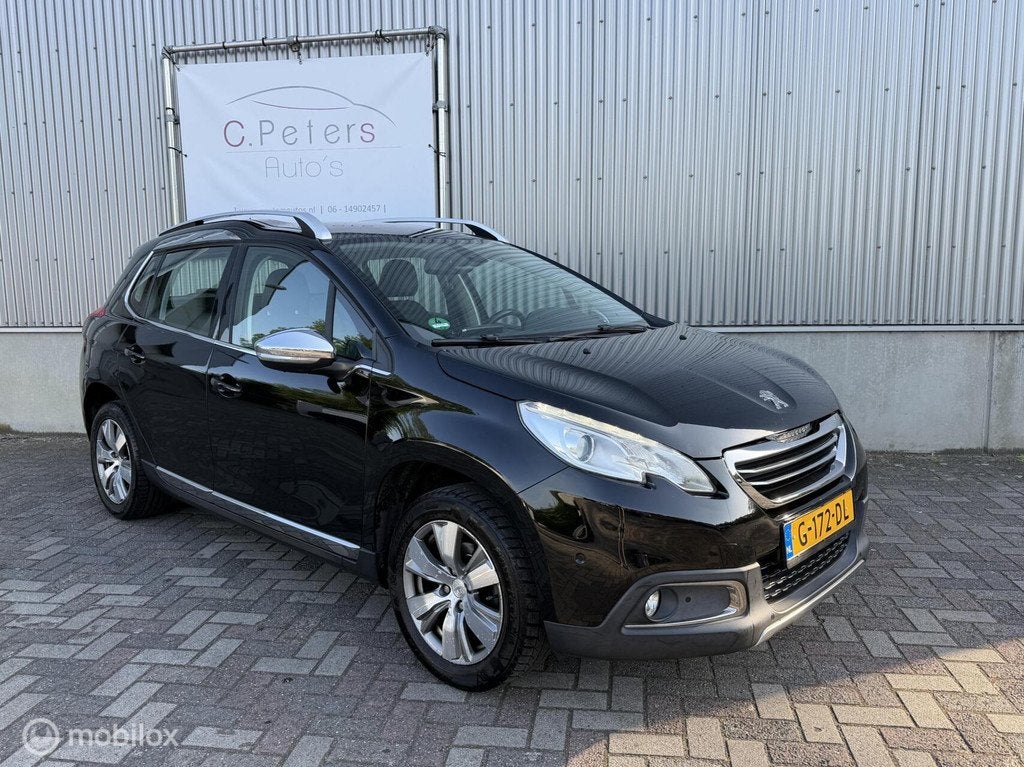 Peugeot 2008 1.2 VTi Allure Pack 2013 / Navigatie / Trekhaak, Auto's, Voorwielaandrijving, Euro 5, 1199 cc, Zwart