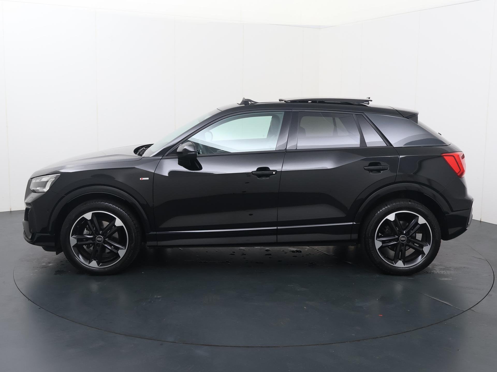 Audi Q2 35 TFSI S Edition | 150 PK | Automaat | Trekhaak | P, Auto's, 4 cilinders, Leder en Stof, Zwart, Origineel Nederlands