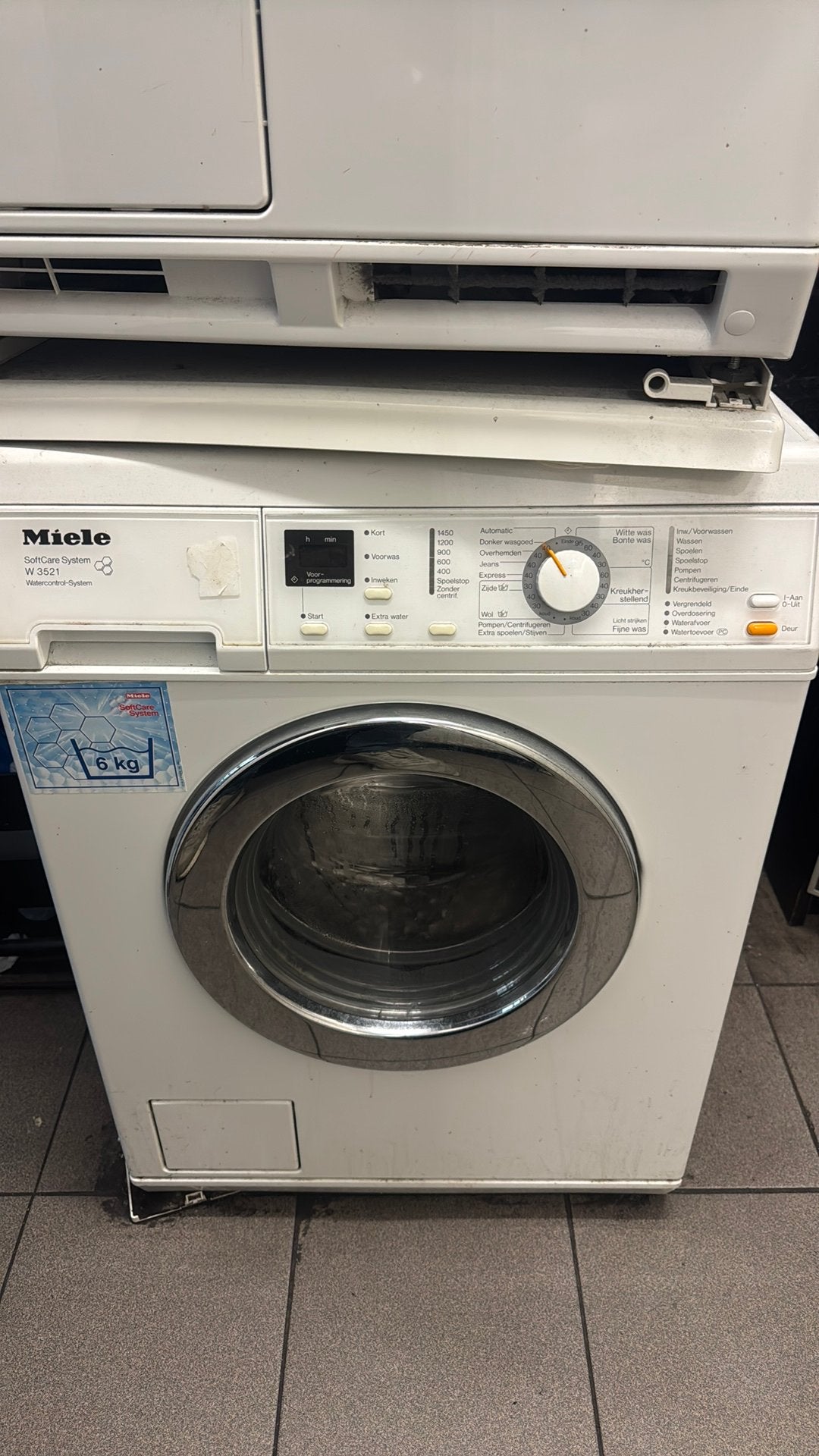 Miele Wasmachine & droger, Ophalen, 1200 tot 1600 toeren, Zo goed als nieuw, 85 tot 90 cm