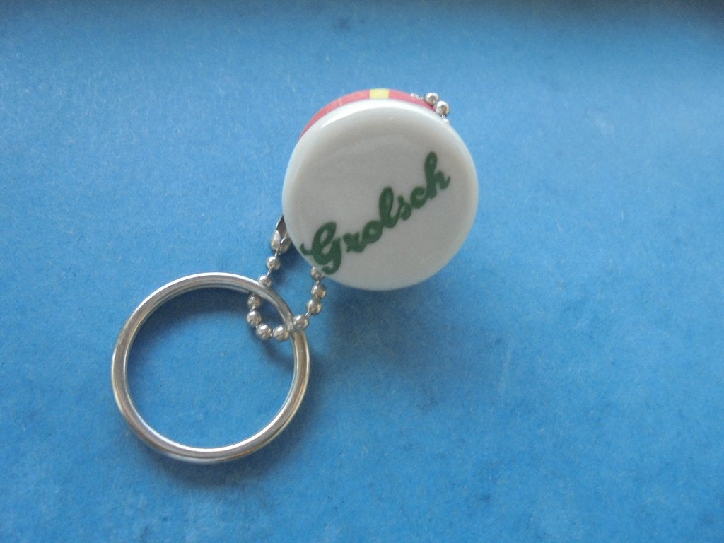 Oude sleutelhanger biermerk GROLSCH uit ENSCHEDE, Ophalen of Verzenden, Zo goed als nieuw, Merk