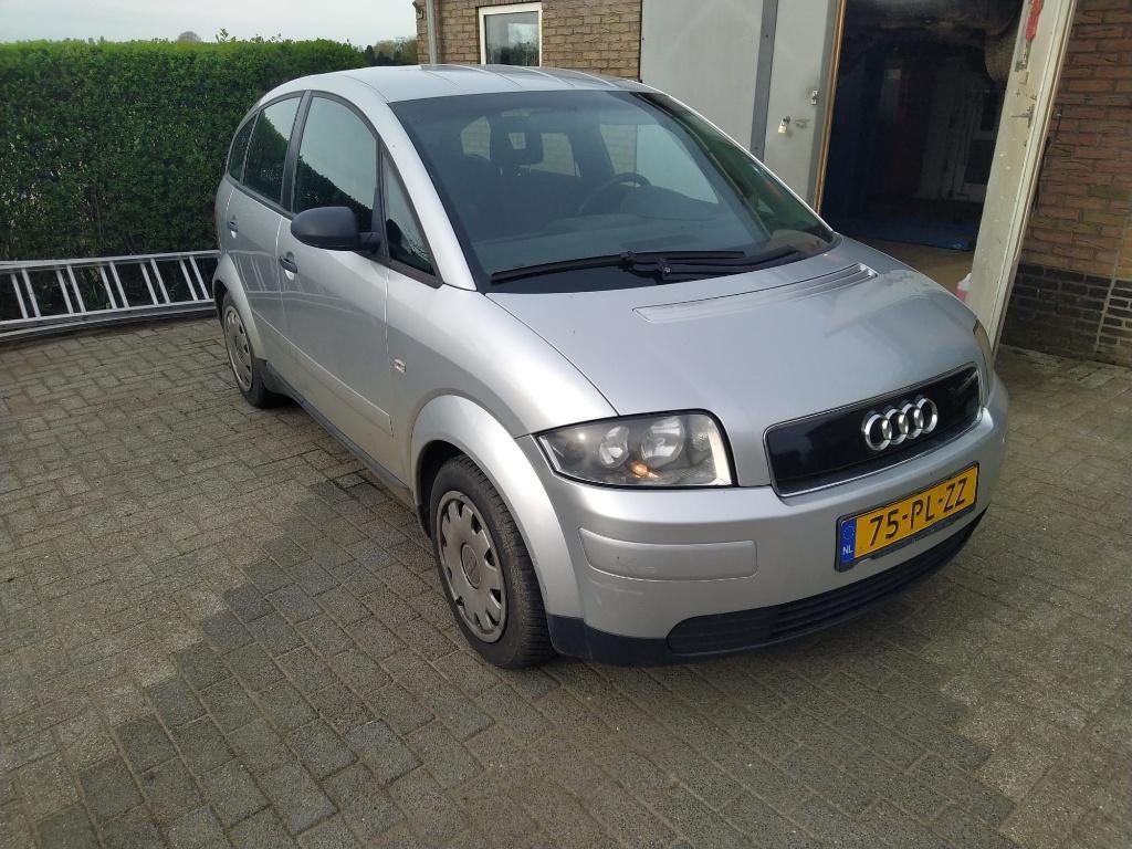 Audi A2 1.4 55KW 2002 Grijs, Auto's, Audi, Voorwielaandrijving, Stof, 4 cilinders, Airconditioning