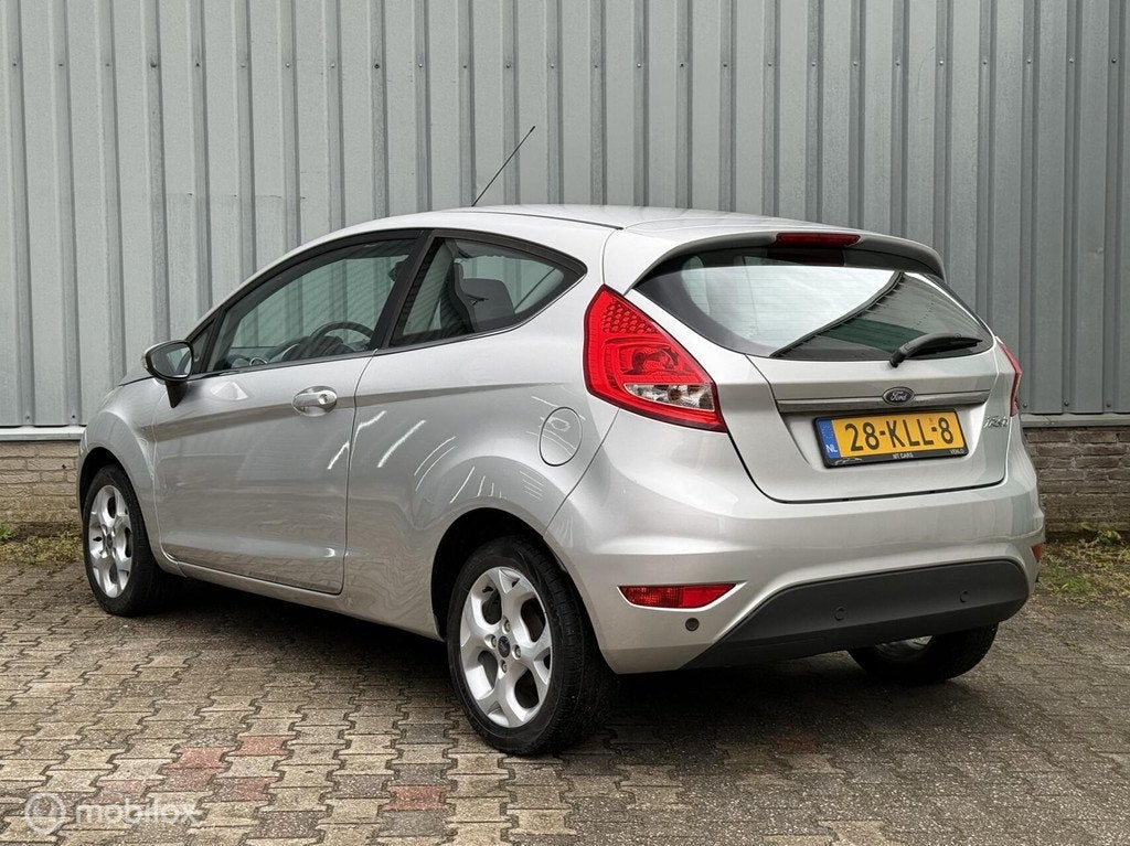 Ford Fiesta 1.25 Titanium | Climate | Parkeer Sens. | Aux, Auto's, Voorwielaandrijving, Euro 5, Stof, 4 cilinders