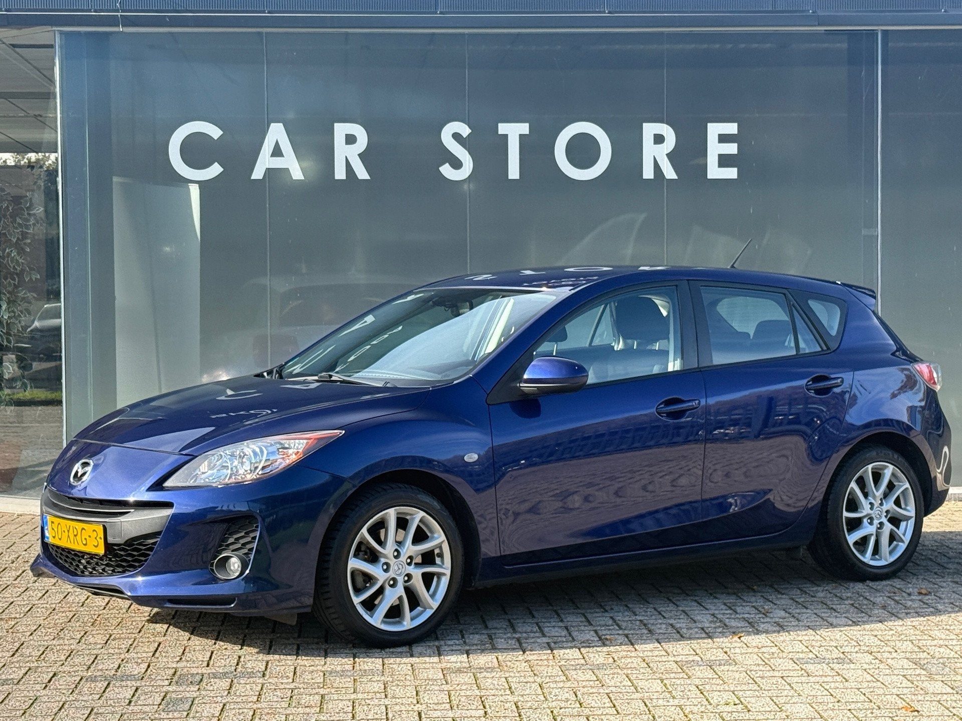 Mazda 3 2.0 Automaat Navigator Navi|Carplay|Stoelver|Trekhaa, Auto's, Euro 5, Stof, Gebruikt, Zwart
