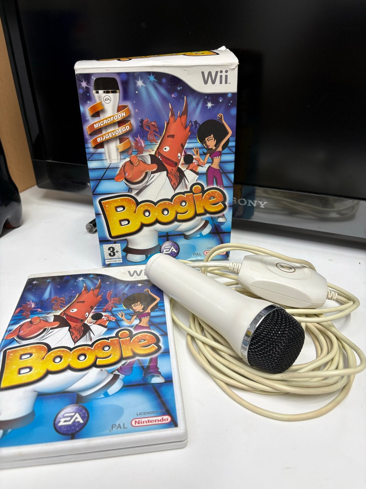 Boogie Wii met microfoon - Dans- en zangplezier!, Spelcomputers en Games, Games | Nintendo Wii, Muziek, 1 speler, Eén computer