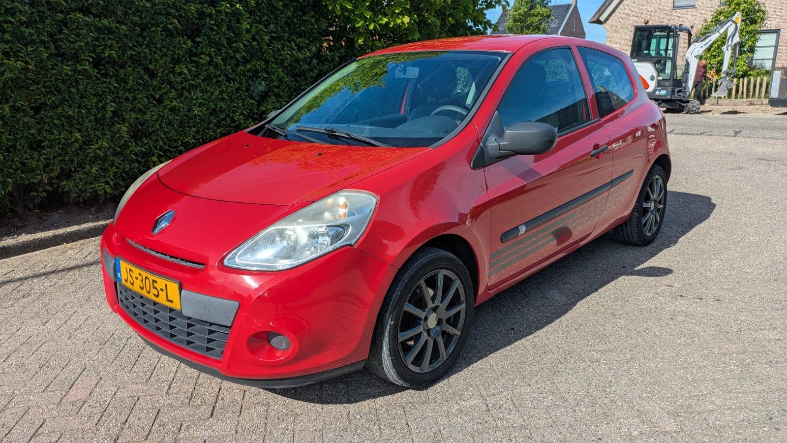 Renault Clio 1.2 16V 55KW 3-DRS E4 2012 Rood, Auto's, Voorwielaandrijving, 4 cilinders, 49 €/maand, Bedrijf