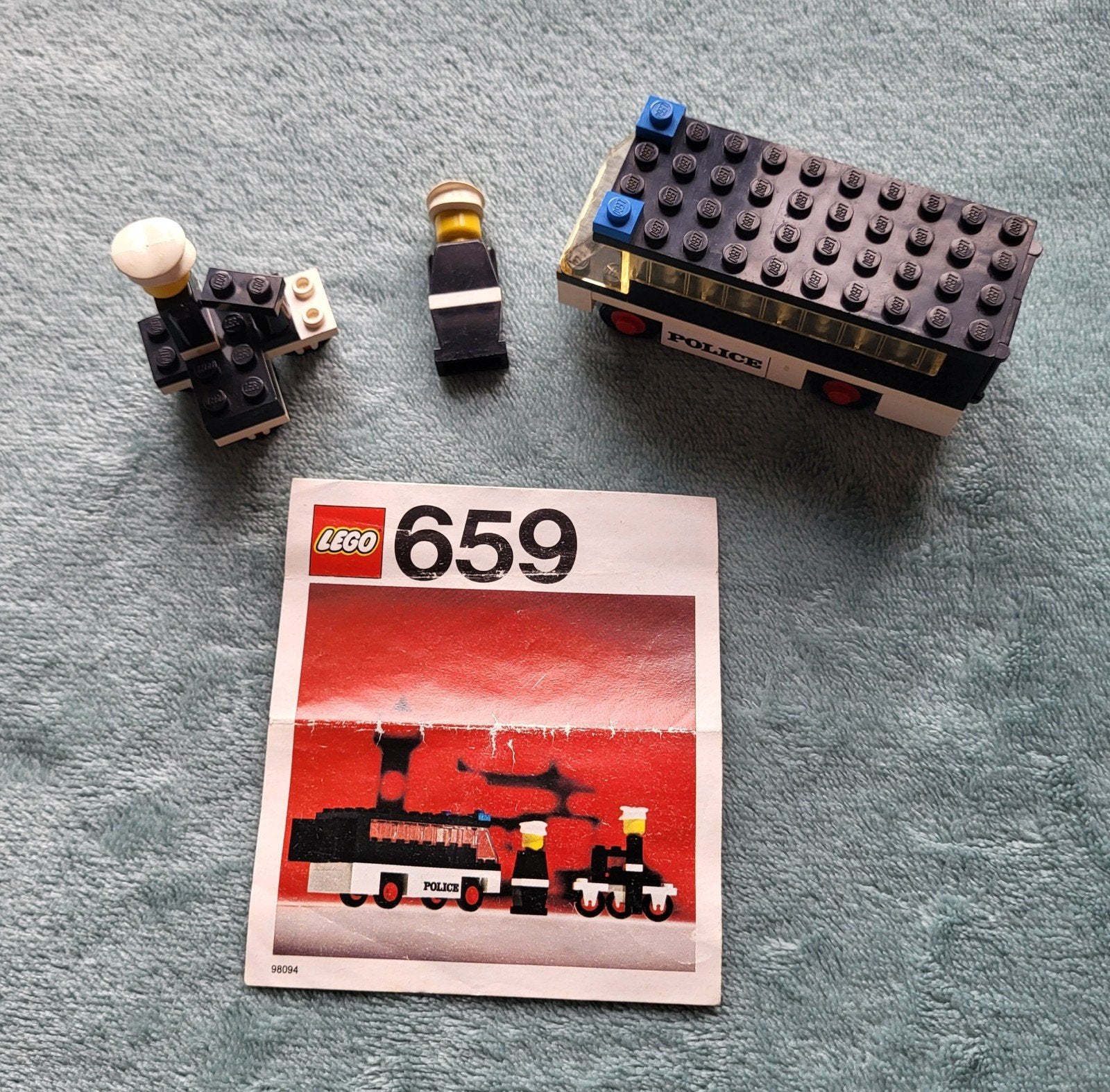 Lego Politie auto bus (set 659) motor / poppetjes / boekje., Gebruikt, Lego, Ophalen of Verzenden, Compleet