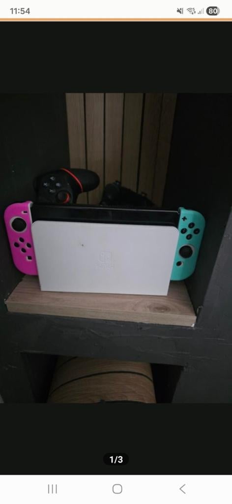 Nintendo switch oled, Spelcomputers en Games, Spelcomputers | Nintendo Switch, Ophalen of Verzenden, Zo goed als nieuw, Met 2 controllers