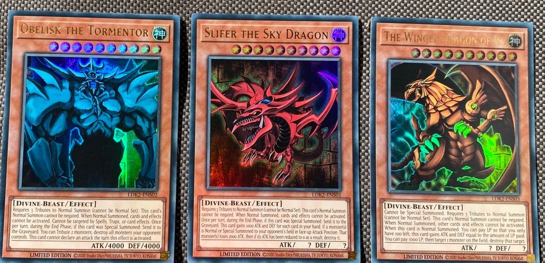 Yu-Gi-Oh! Legendary Egyptian God Card Set Mint -Near Mint !, Ophalen of Verzenden, Zo goed als nieuw, Meerdere kaarten, Foil