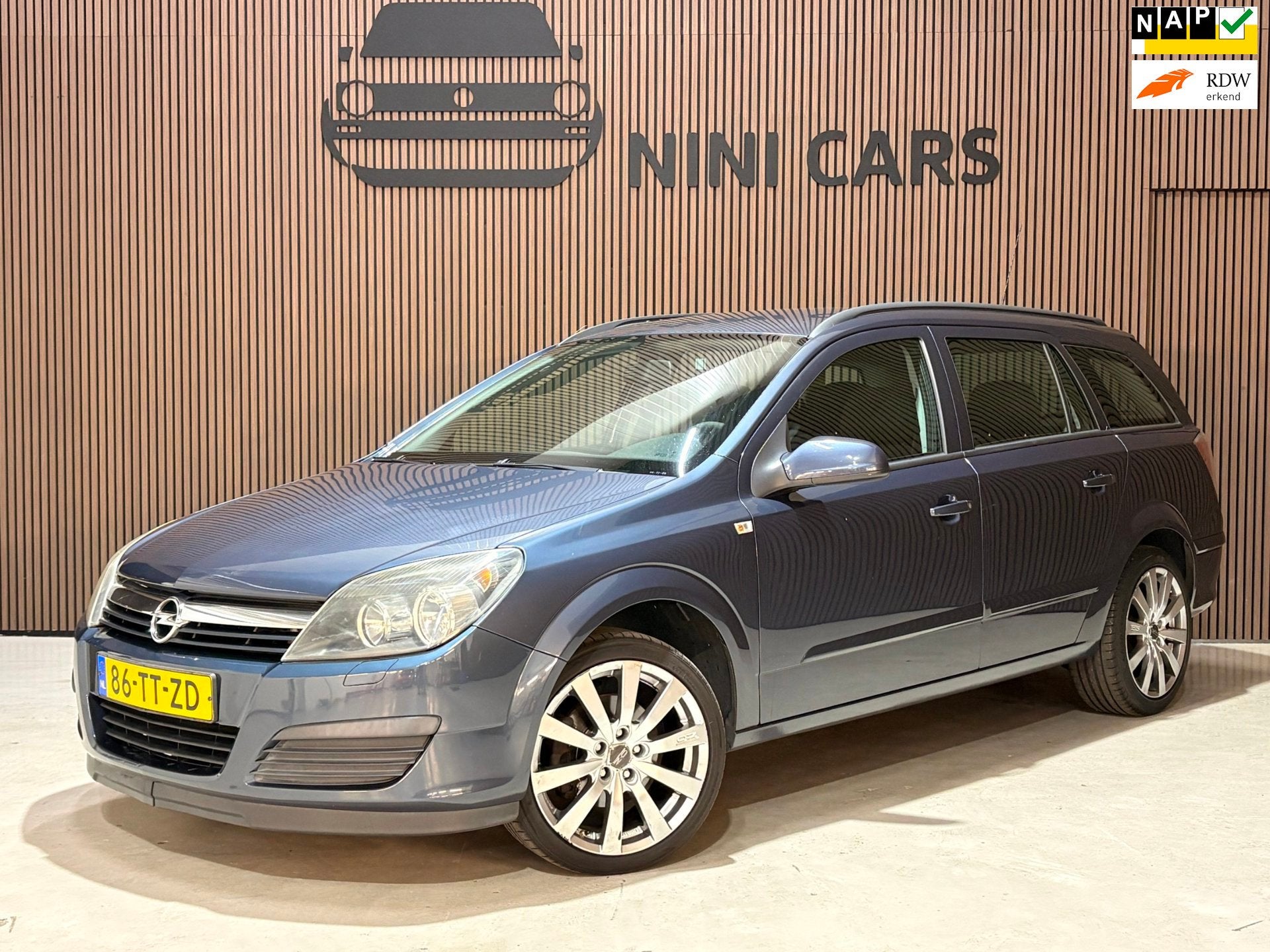 Opel Astra Wagon 1.6 Edition nieuwe APK NAP trekhaak, Auto's, Voorwielaandrijving, Gebruikt, Zwart, 4 cilinders