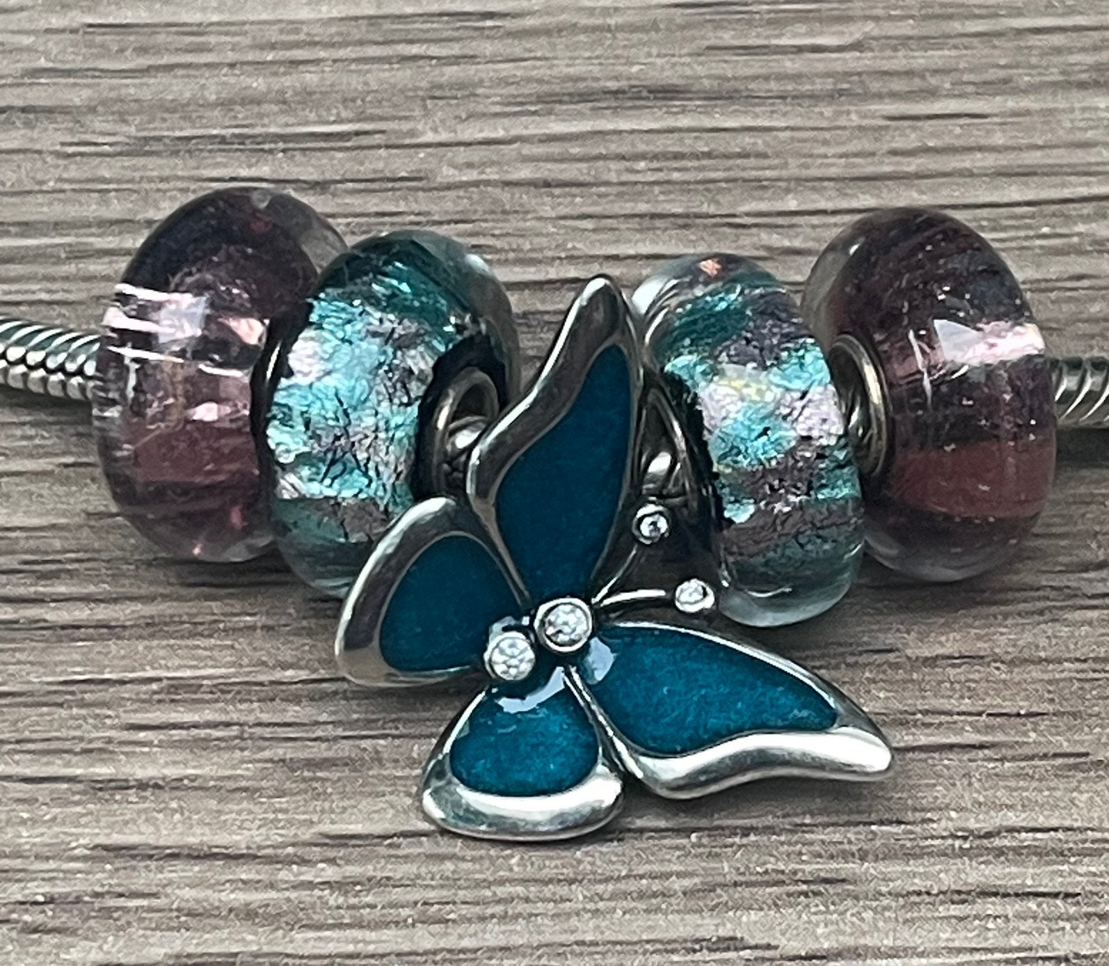 Overgroot zilveren vlinder en bedels van Murano glas nieuw, Nieuw, 4 bedels of meer, Zilver, Ophalen
