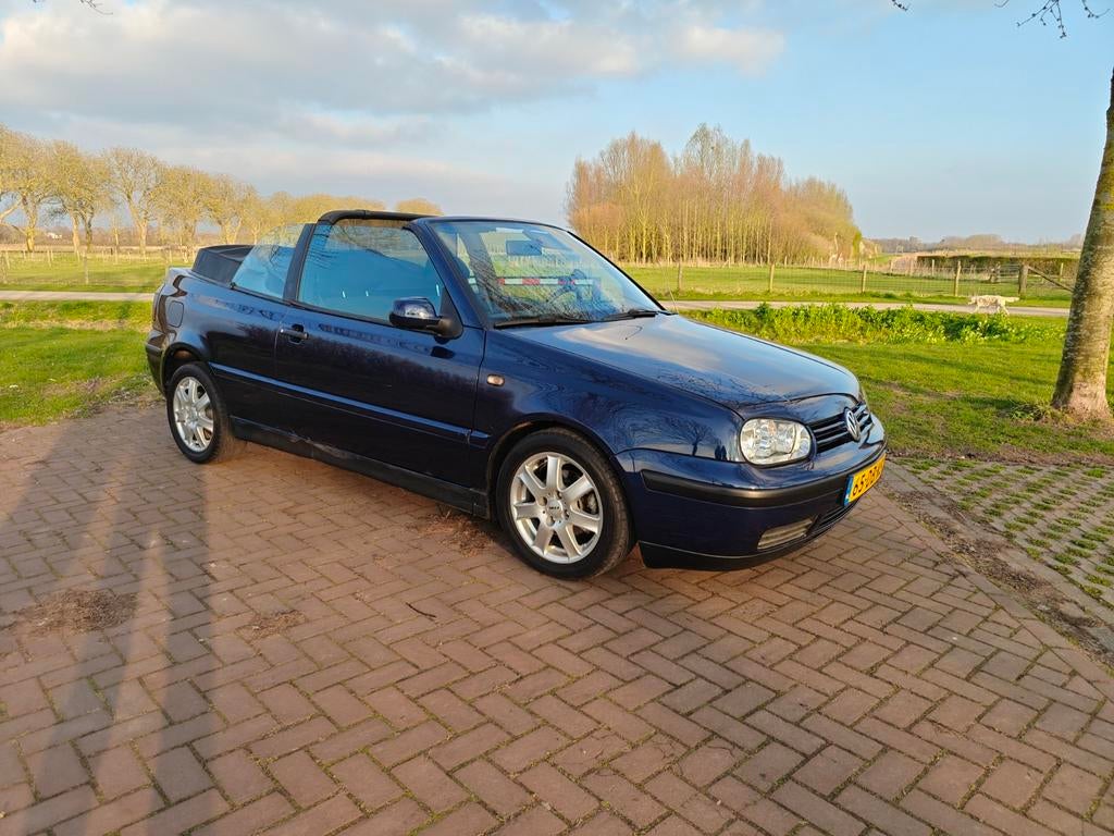 Volkswagen Golf 1.8 Cabriolet 55KW 1999 Blauw, Auto's, Stof, 74 pk, Zwart, 4 cilinders