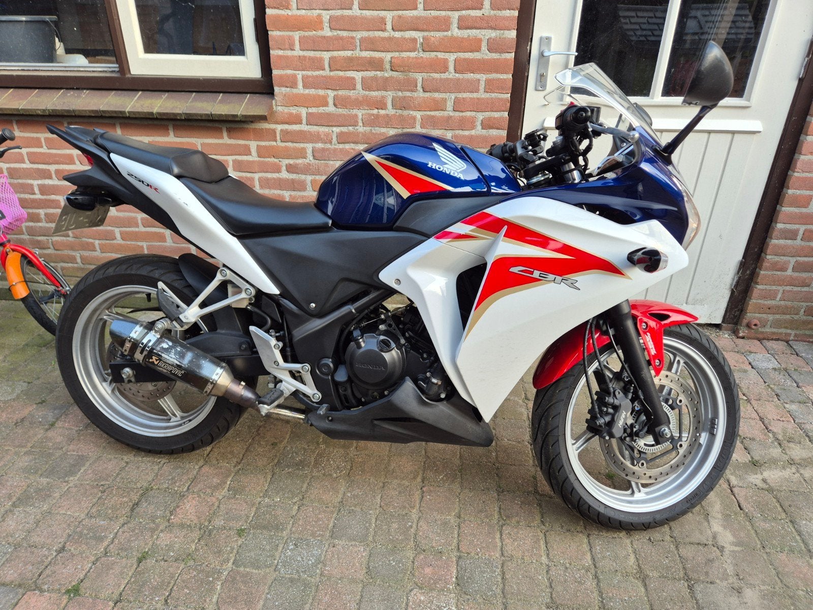 Honda CBR250R 2014 - Sportieve A2 motor met lage km-stand, Motoren, Motoren | Honda, 250 cc, Occasion, ABS, Handgeschakeld