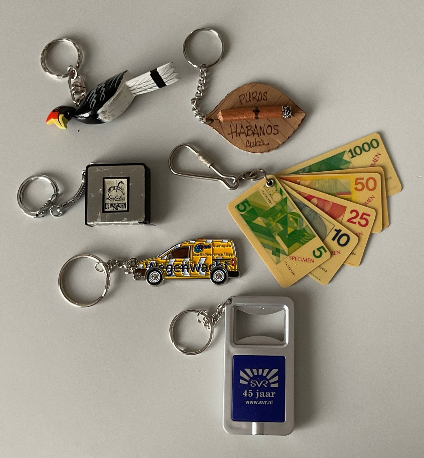 Diverse sleutelhangers: Cuba, vogel, meetlint, auto, geld, Ophalen of Verzenden, Zo goed als nieuw, Overige typen
