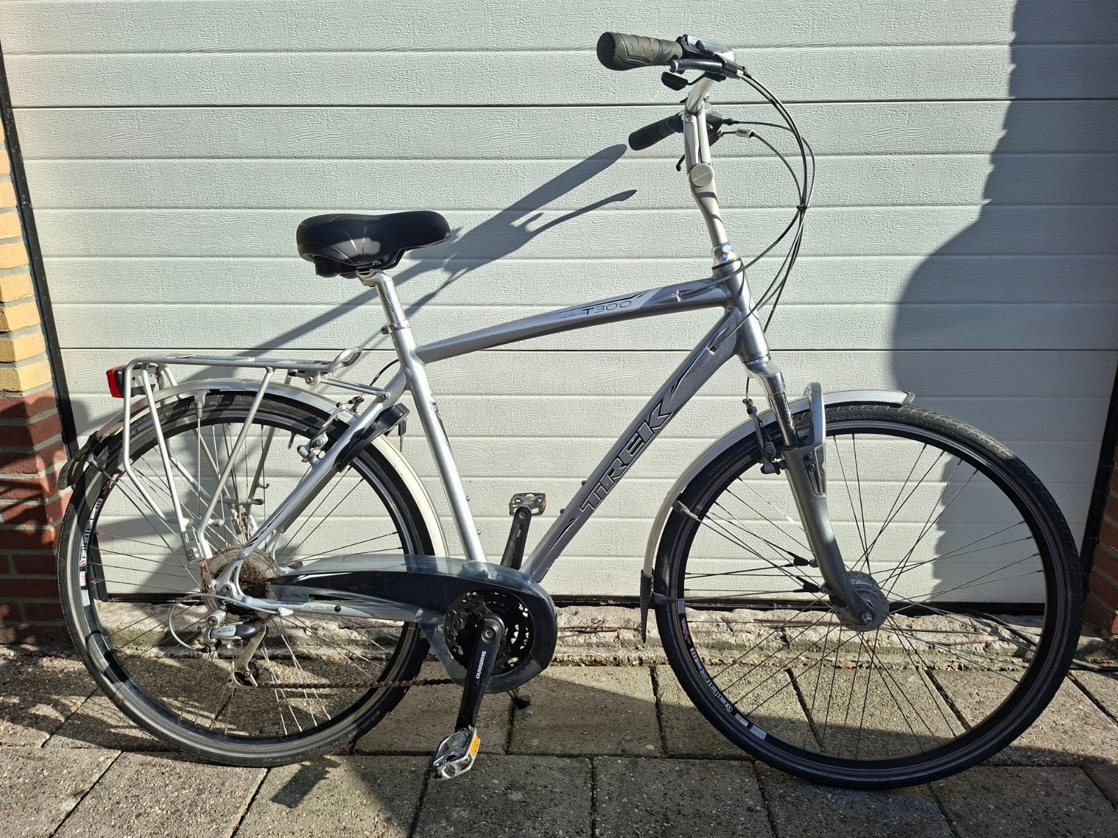Te koop : Nette Trek navigator T300 Tour herenfiets, Fietsen en Brommers, 28 inch, Gebruikt, Vering, Velgrem