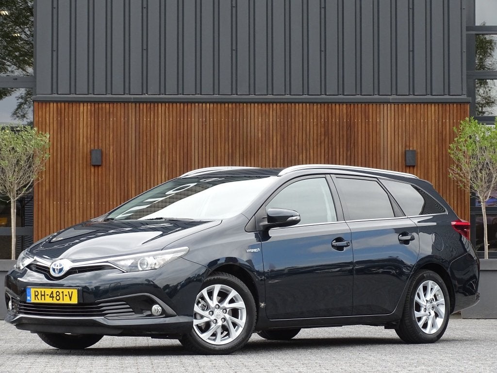 Toyota Auris Touring Sports 1.8 Hybrid 136PK / Dynamic Edit, Auto's, Automaat, Automatische klimaatregeling, Gebruikt, Euro 6