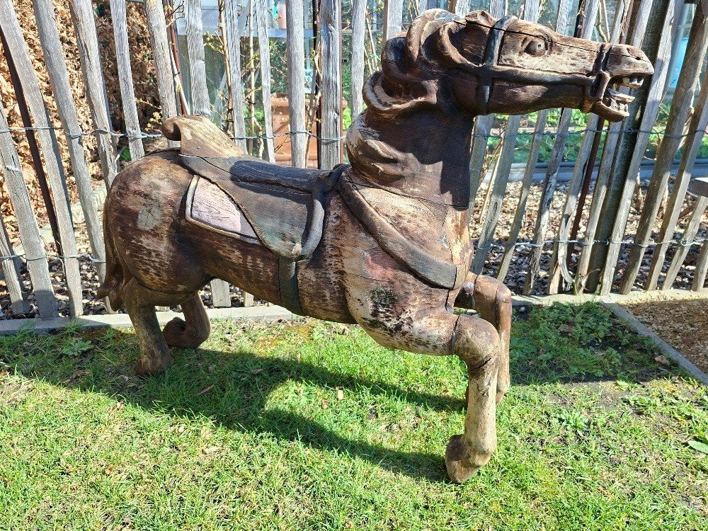 houten paardje, Ophalen