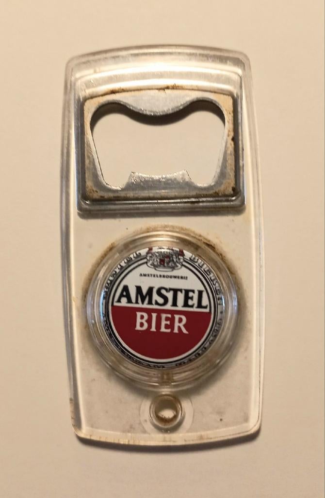 Flessenopener met een flessen dop ingecield in plastic., Ophalen of Verzenden, Flesje(s), Overige merken
