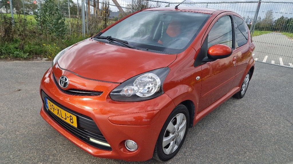 Toyota Aygo 1.0 12V Vvt-i 5DRS 2012, Auto's, Voorwielaandrijving, Overige kleuren, 4 stoelen, Origineel Nederlands
