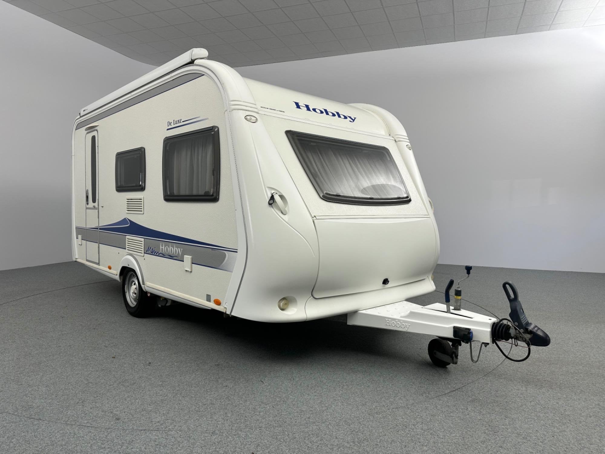 Hobby De Luxe 440 SF Cassetteluifel Mover, Caravans en Kamperen, Caravans, Serviceluik, Vast bed, Hobby, Bedrijf