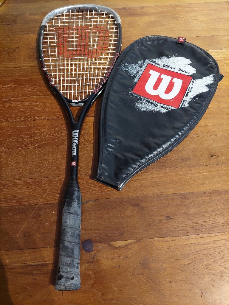 Titanium Wilson Squash racket, Sport en Fitness, Ophalen of Verzenden, Zo goed als nieuw, Racket, Met hoes