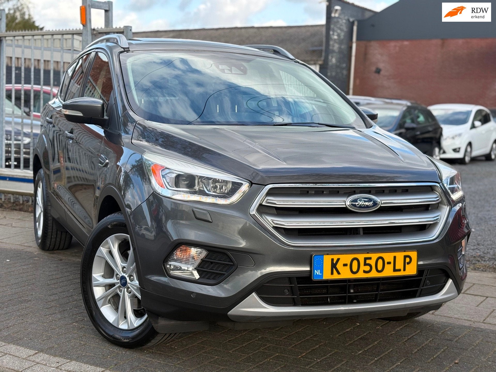Ford Kuga 1.5 EcoBoost Titanium | Panoramadak | A.Camera | H, 4 cilinders, Leder en Stof, Automatische klimaatregeling, Bedrijf