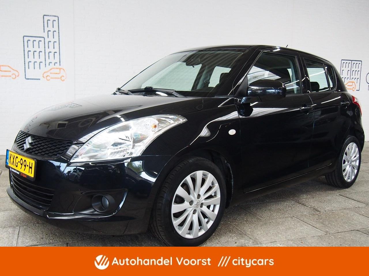 Suzuki Swift 1.2 Exclusive EASSS Cruise (APK:Nieuw) Incl.Gar, Voorwielaandrijving, Euro 5, Stof, Gebruikt