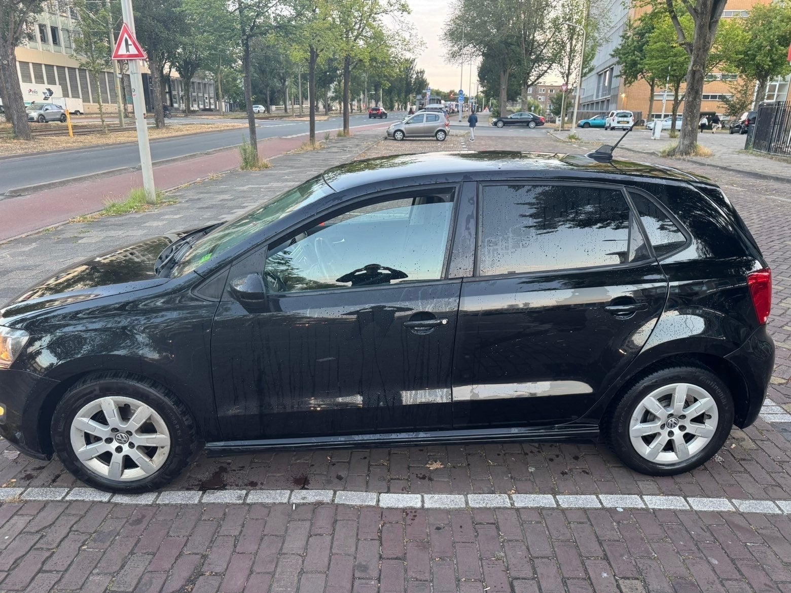 Volkswagen Polo 1.2 TDI NAP BM 2012 Zwart, Voorwielaandrijving, 74 pk, 1199 cc, 96 €/maand