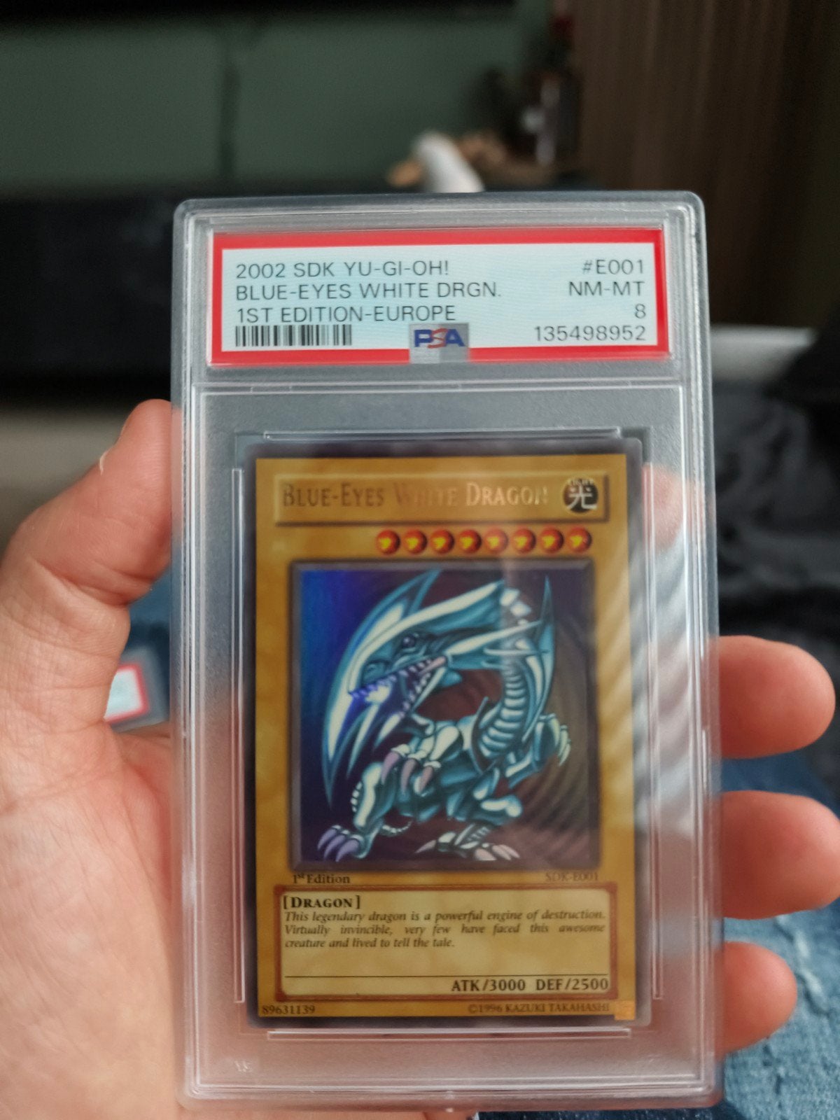 Yu-Gi-Oh! Blue-Eyes White Dragon 1st Edition PSA 8, Ophalen of Verzenden, Zo goed als nieuw, Losse kaart, Foil
