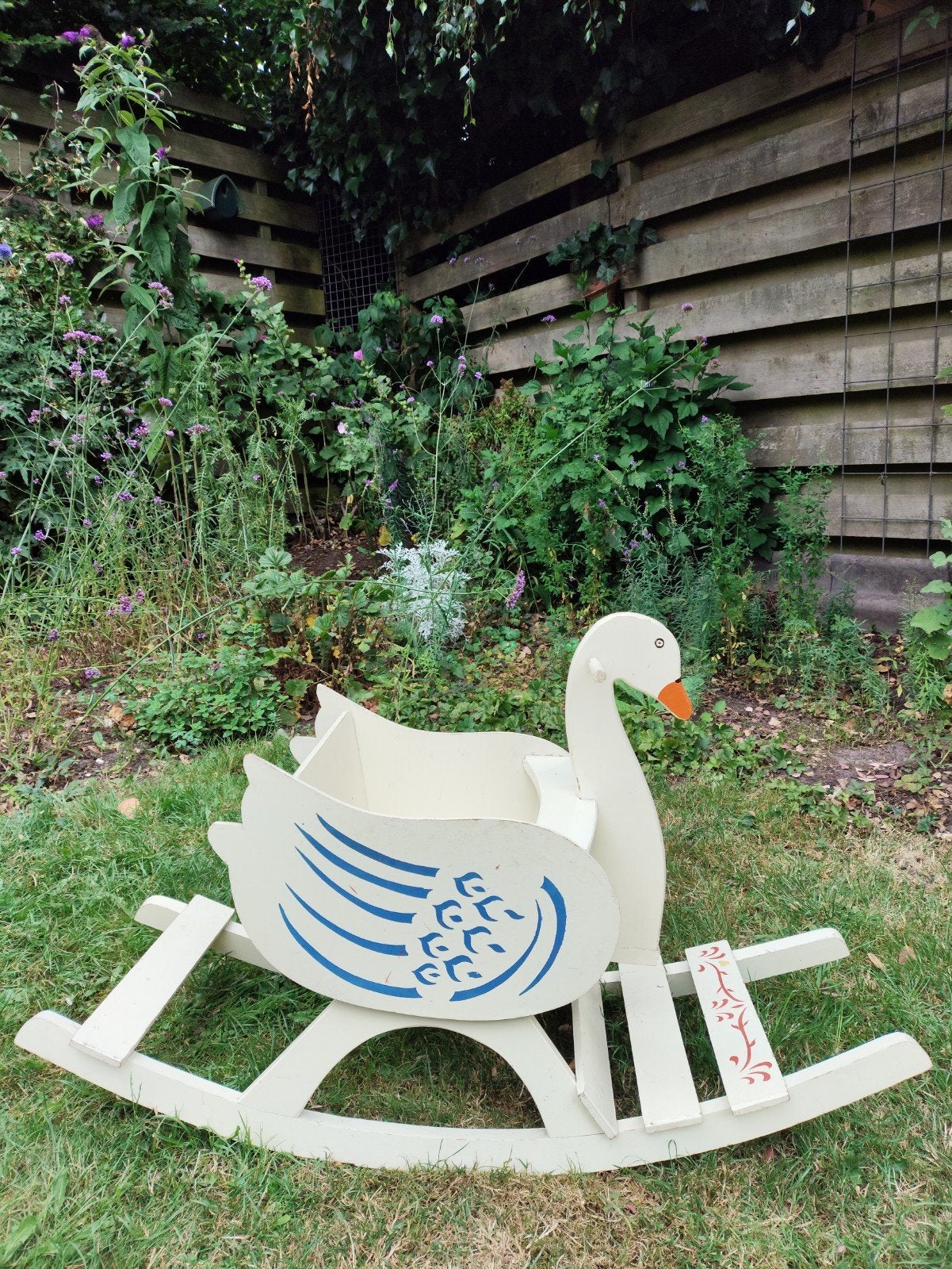 Vintage houten hobbelzwaan, Ophalen
