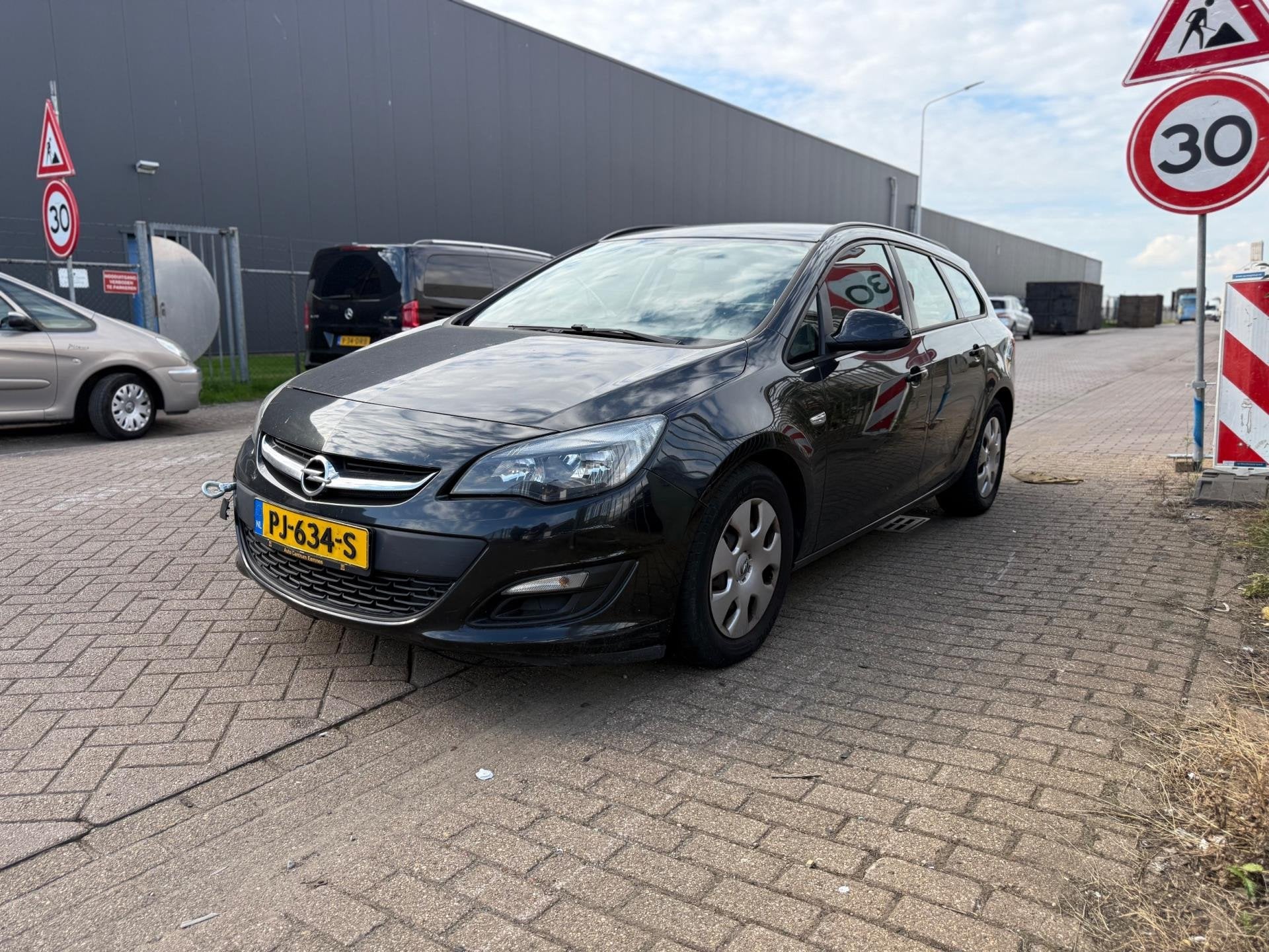 Opel Astra Sports Tourer 1.3 CDTi S/S Cosmo, Auto's, Voorwielaandrijving, Euro 5, 730 kg, Gebruikt