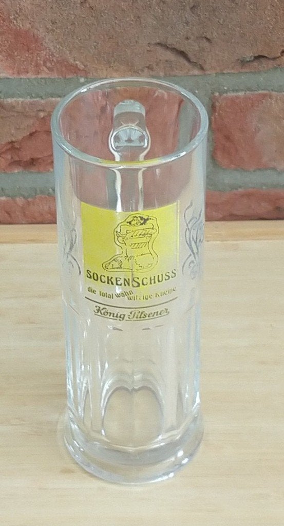 Bierglas Sockenschuss en Amstel bockbier, volgnr 81, Ophalen of Verzenden, Gebruikt, Bierglas