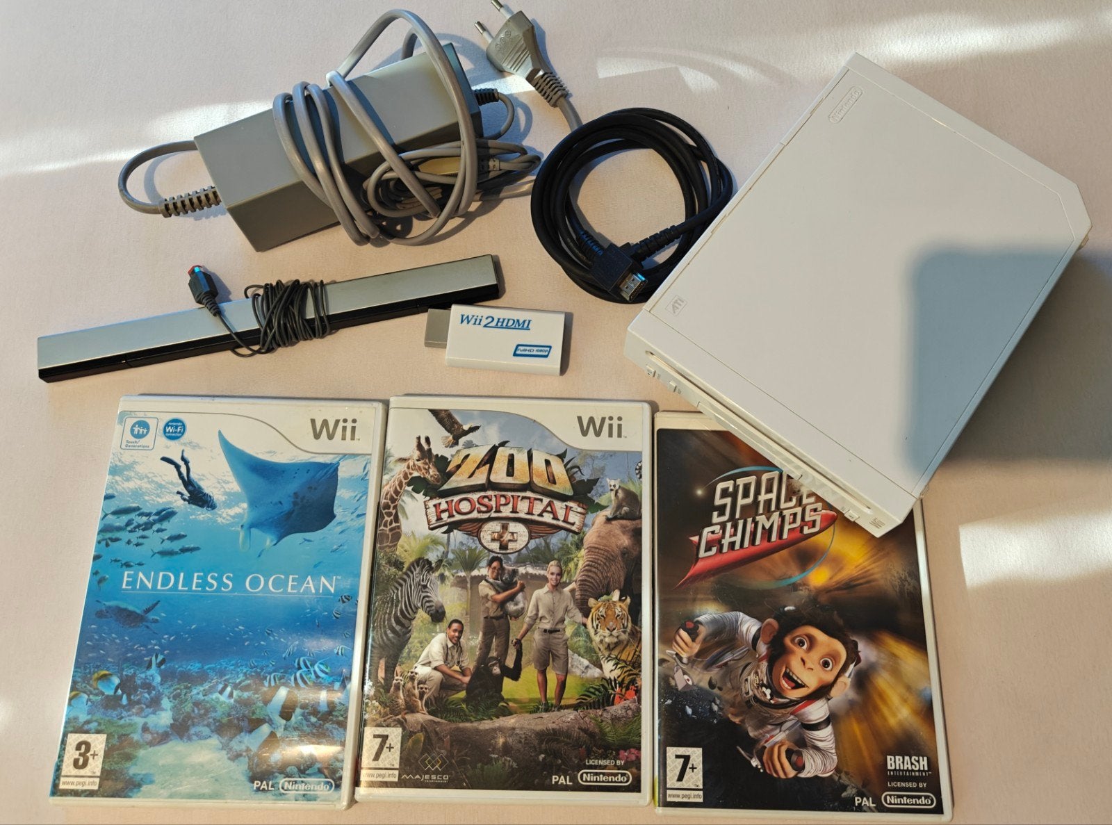 Nintendo Wii + Spellen (Zonder controller), Verzenden, Gebruikt, Zonder controller, Met games