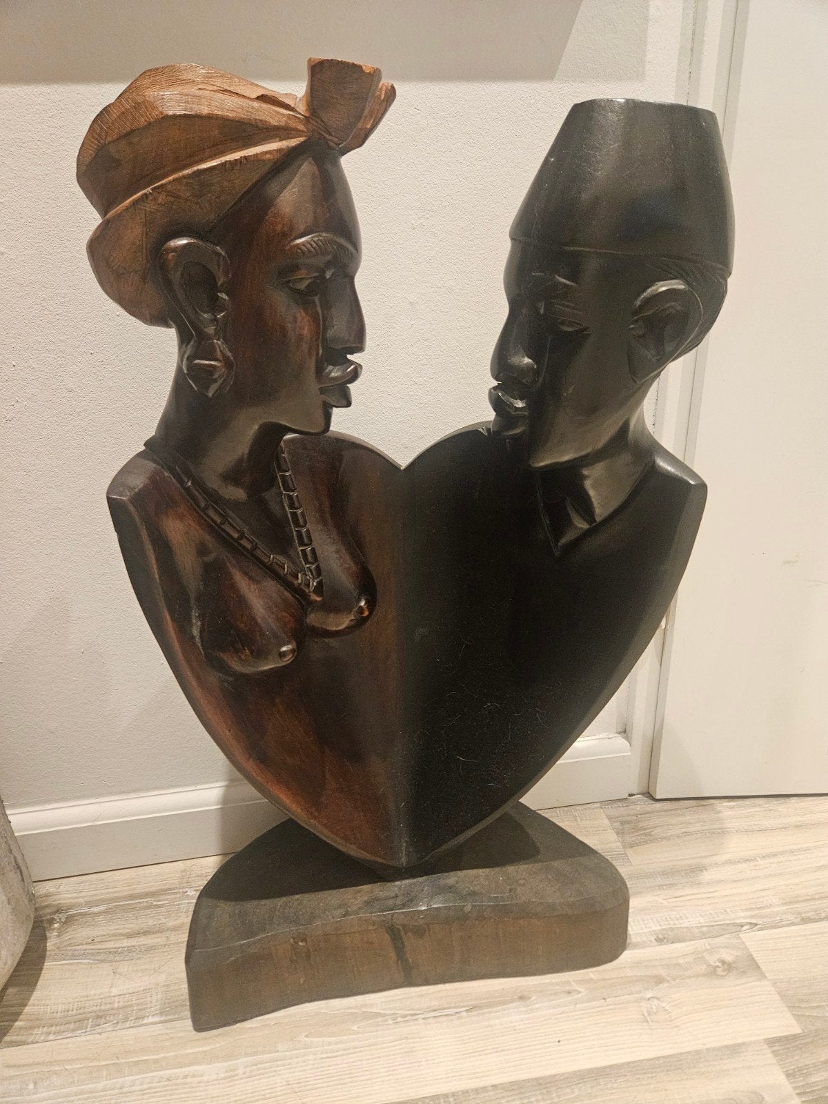 afrikaans houtsnijwerk beeld, Ophalen