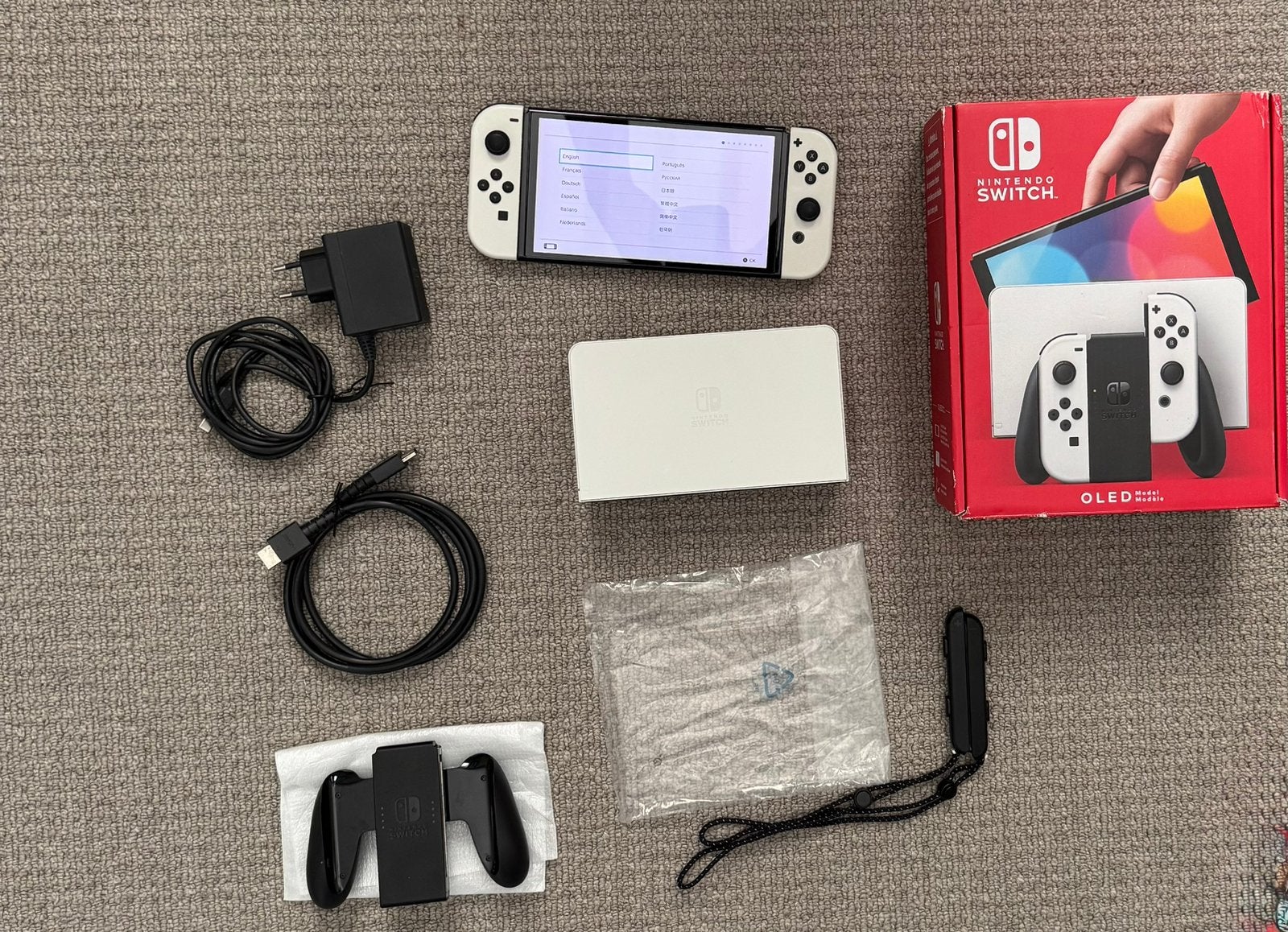 Nintendo Switch OLED Wit - Absolute nieuwstaat, Spelcomputers en Games, Spelcomputers | Nintendo Switch, Ophalen of Verzenden