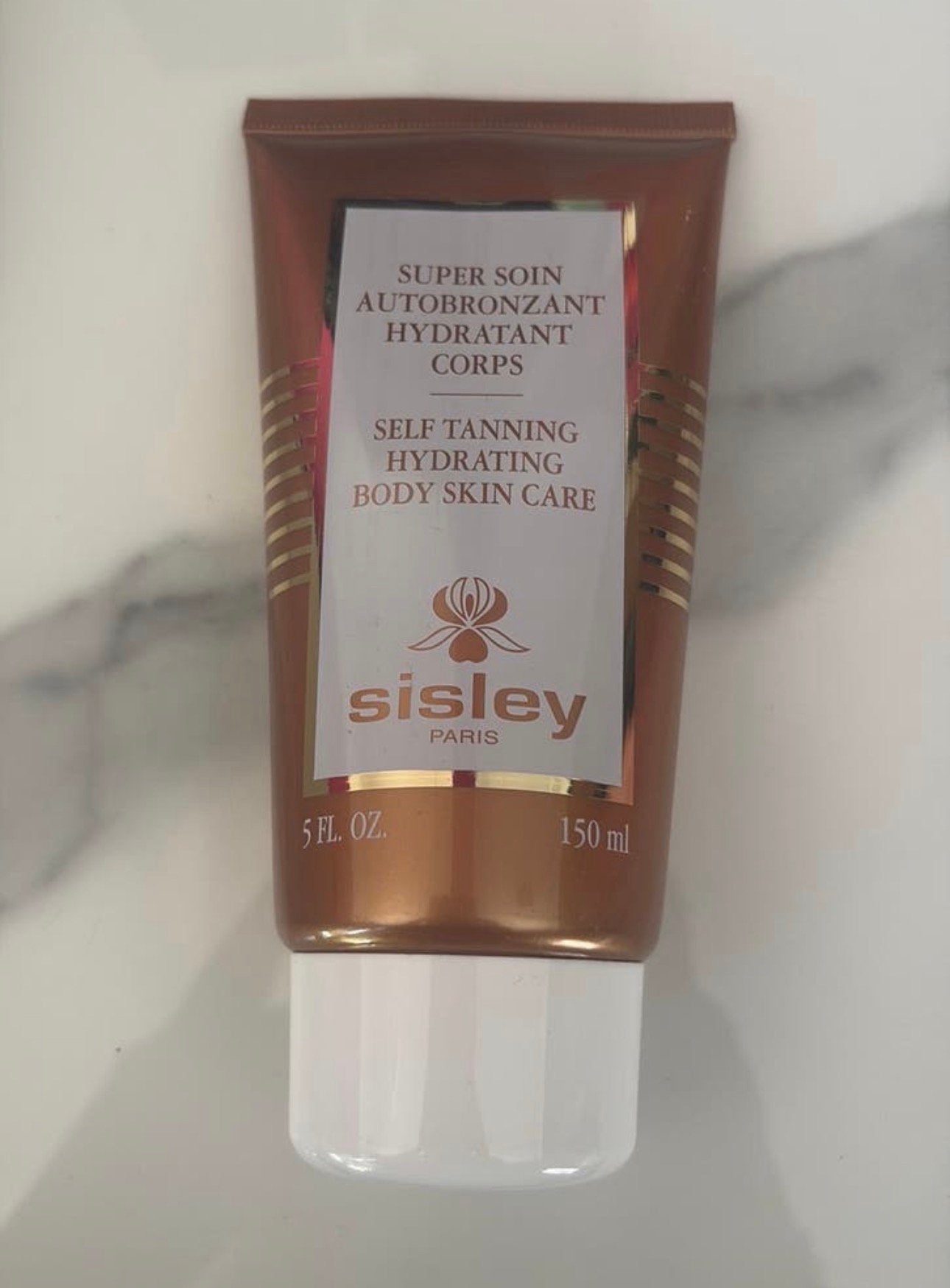 Sisley self tanning body 150 ml nieuw, Ophalen of Verzenden, Nieuw, Bodylotion, Crème of Olie