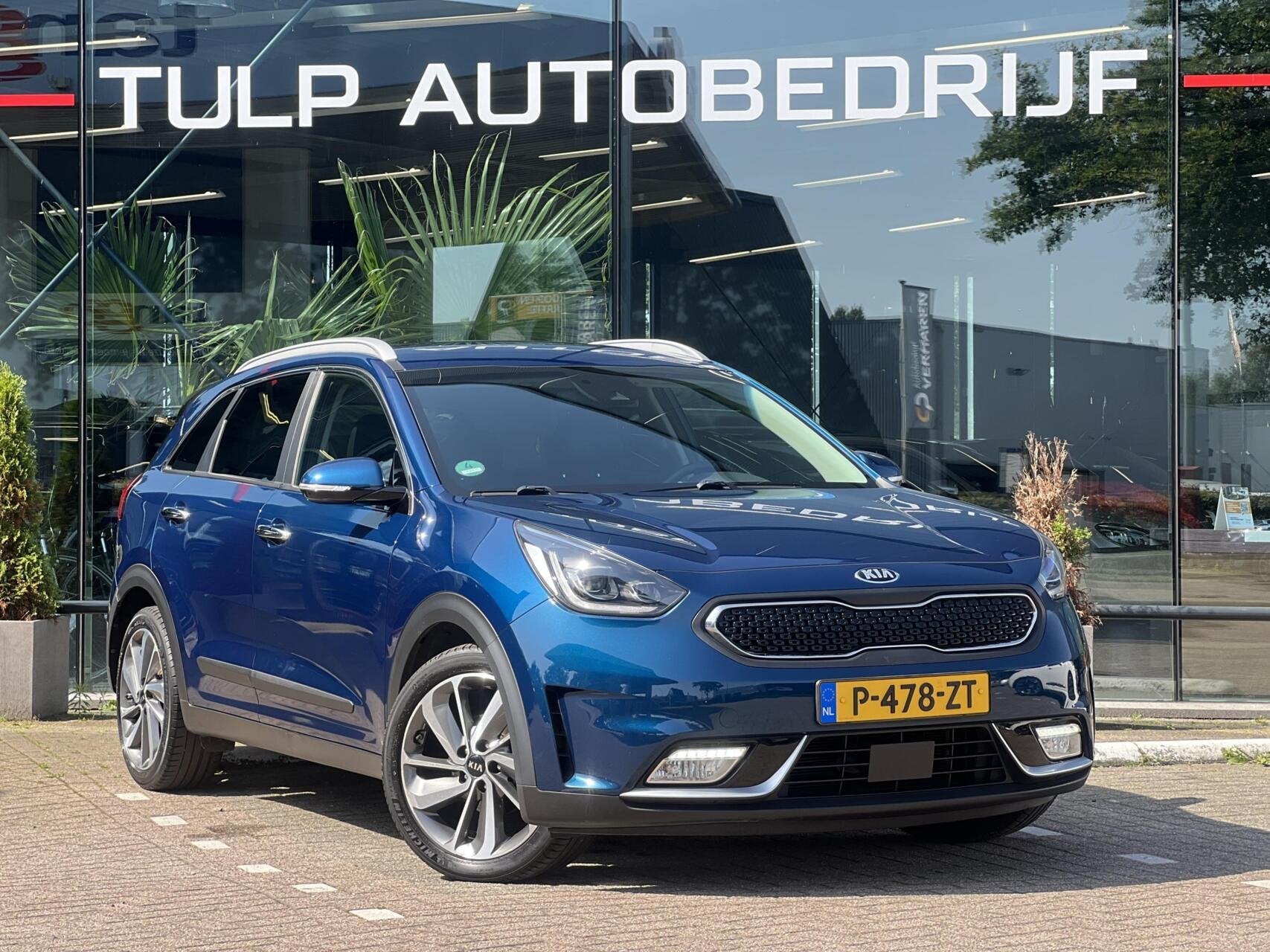 Kia Niro 1.6 GDi Hybrid ExecutiveLine Clima Leder Cruise JBL, Auto's, Dealer onderhouden, Blauw, 23 km/l, Leder