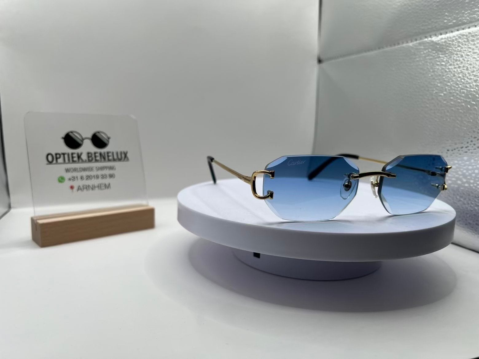Cartier piccadilly goud met blauwe glazen, Ophalen of Verzenden, Zo goed als nieuw, Zwart, Overige merken