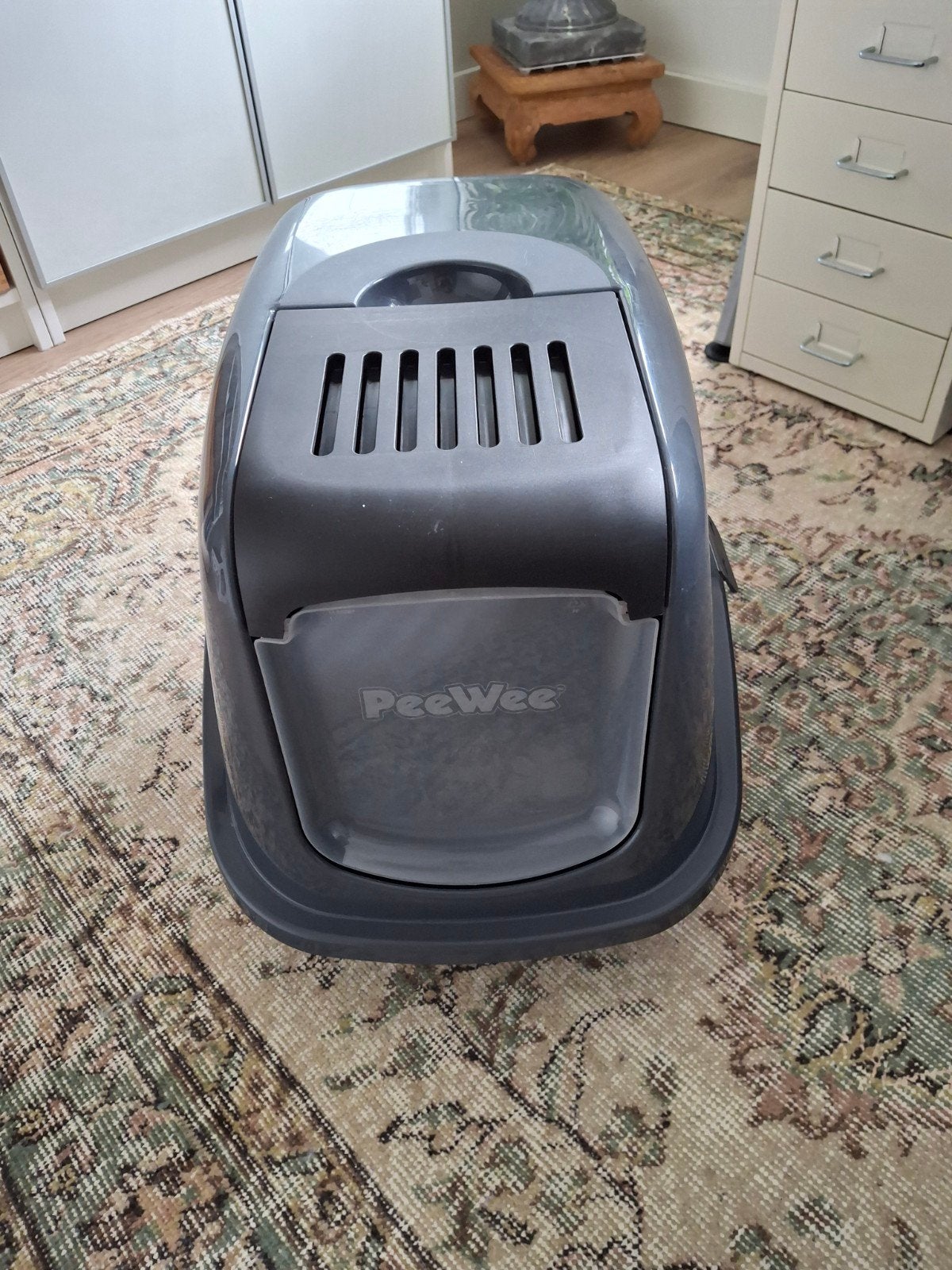 PeeWee kattenbak, Ophalen