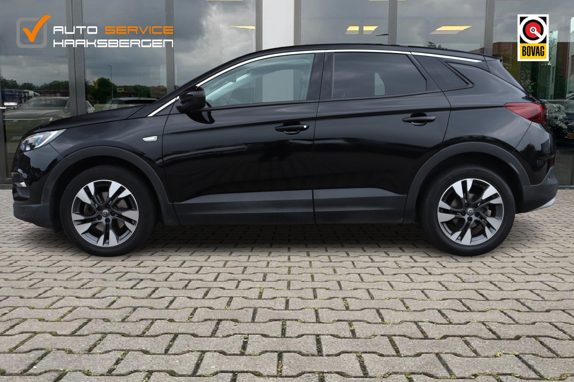 Opel Grandland X 1.2 Turbo Business Executive | Pano | ACC |, Stof, Gebruikt, 1199 cc, Zwart