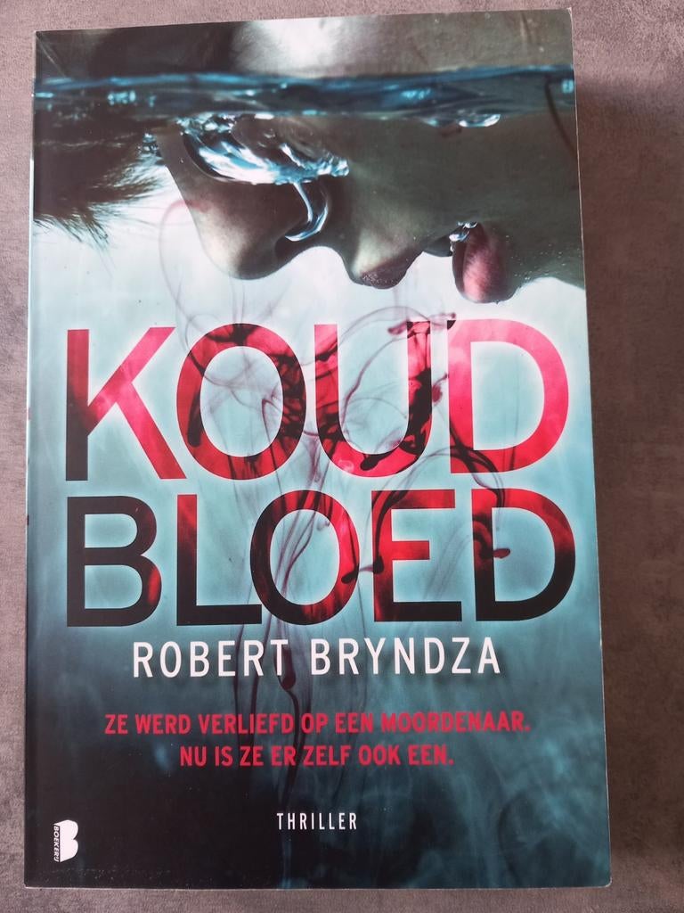 Robert Bryndza - Koud bloed, Boeken, Thrillers, Zo goed als nieuw, Ophalen of Verzenden