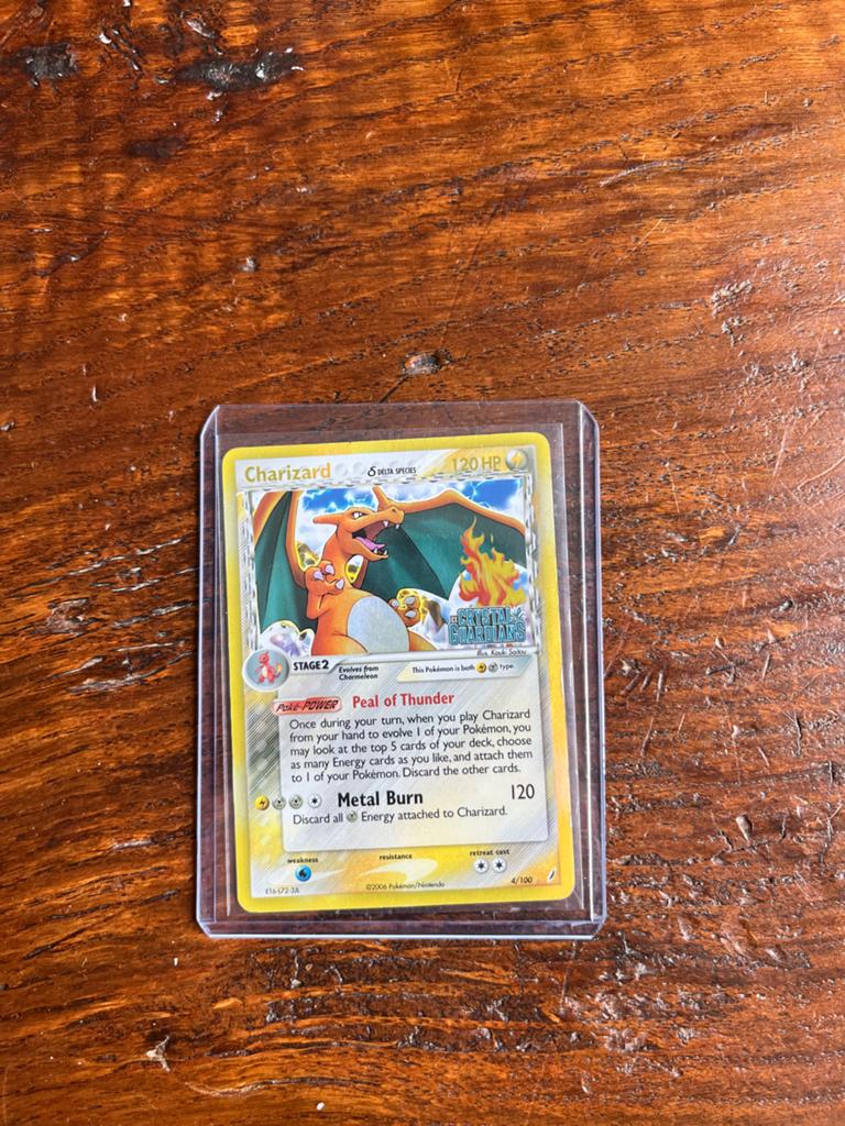 Charizard Crystal Guardians Delta Species Holo 4/100, Ophalen of Verzenden, Zo goed als nieuw, Losse kaart