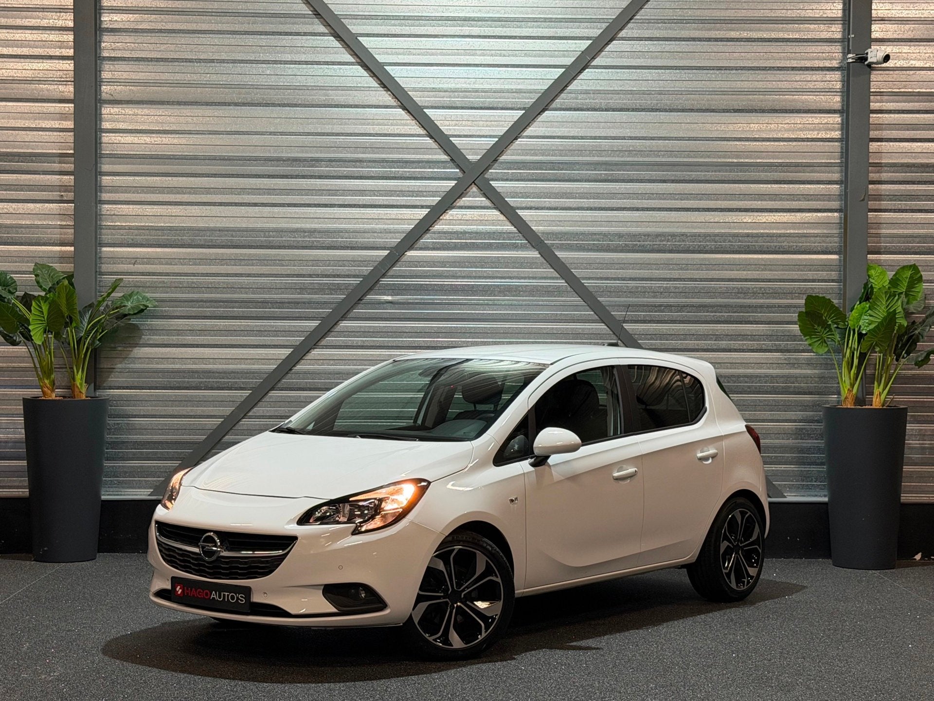 Opel Corsa E 1.4 NAVI/CRUISE/PDC/CAMERA/STOEL+STUURVERW/CARP, Auto's, Gebruikt, 4 cilinders, Wit, Origineel Nederlands