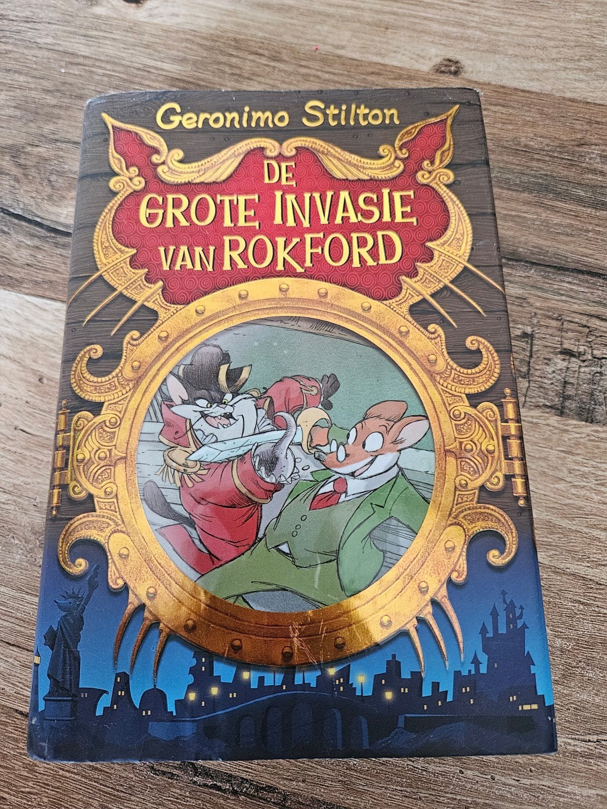 Geronimo Stilton - De grote invasie van Rokford, Boeken, Fictie algemeen, Geronimo Stilton, Ophalen of Verzenden, Zo goed als nieuw